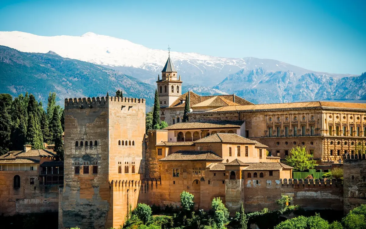 The Alhambra with the snow-capped Sierra Nevada behind it