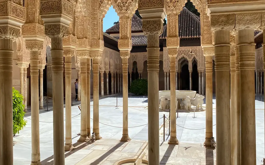 The Court of the Lions with its marble fountain in the Alhambra, Granada