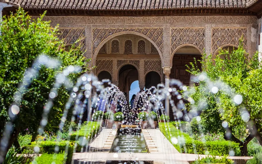 Detailed stucco carving in the Nasrid Palaces of the Alhambra